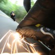 Sparks Fly as Rider Touches the Road Sparks Fly as Rider Touches the Road
